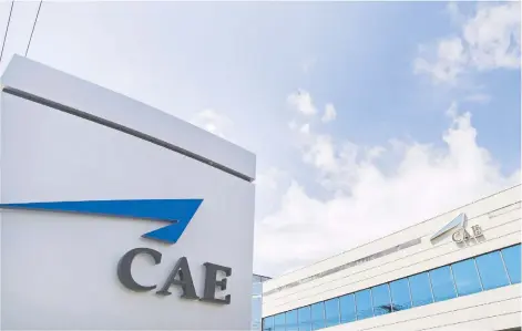  ?? GRaHAM HUGHES/THE CANADIAN PRESS FILES ?? CAE CEO Marc Parent says the Montreal-based company “delivered a record performanc­e” for the year as a whole as it met its annual outlook. Its stock closed up $4.67 or 14.6 per cent to $36.67 in trading on the Toronto Stock Exchange.