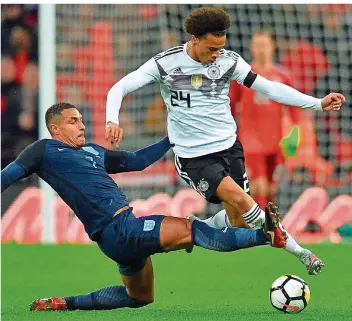  ?? FOTO: KIRK/AFP ?? Leroy Sané (rechts) wird hier vom Engländer Jake Livermore unsanft zu Fall gebracht. Der ehemalige Schalker Sané gab vor allem in der ersten Halbzeit eine gute Figur ab und traf einmal nur die Latte.