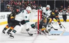  ?? AFP ?? ■ Joe Pavelski (8) of the San Jose Sharks takes a shot as Brayden McNabb (3) of the Golden Knights defends.