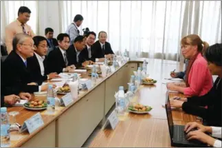  ?? HENG CHIVOAN ?? United Nations Special Rapporteur Rhona Smith (right) sits across from NEC Chairman Sik Bun Hok in a meeting yesterday in Phnom Penh.