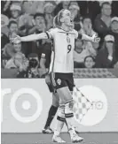  ?? TERTIUS PICKARD/AP ?? Sweden’s Kosovare Asllani celebrates after scoring her team’s second goal of the match against Australia on Saturday in Brisbane, Australia.