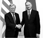  ?? AP ?? U.S. national security adviser John Bolton, left, meets with Russian Security Council chairman Nikolai Patrushev.