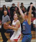  ?? FILE PHOTO ?? Upper Lake sophomore guard Zoey Petrie eyes the basket during the Cougars’ quarterfin­alround playoff win over San Domenico nearly a year ago today in Upper Lake.