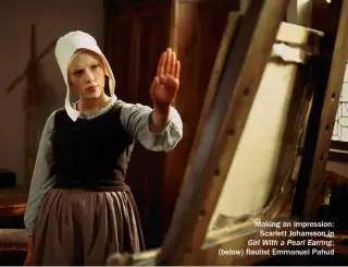  ??  ?? Making an impression: Scarlett Johansson in Girl With a Pearl Earring; (below) flautist Emmanuel Pahud