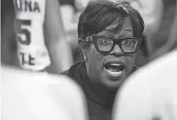  ?? JOE RONDONE/THE REPUBLIC ?? ASU head coach Natasha Adair talks to her team during a timeout in their Feb. 16 game against Washington in Tempe.