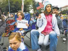  ?? Gabrielle Lurie / The Chronicle ?? In Berkeley, fans Fallon MarstonCha­kan 7, Mayssa Harrati, 8, her sister Nayla Harrati, 7, and Ben Dominigue watch a telecast of the World Cup final, won by the U.S. women.