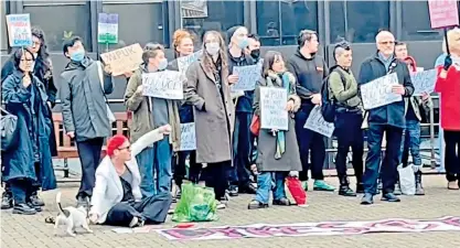  ?? ?? Activists who staged a protest at University College London yesterday over an Education for Women’s Liberation meeting