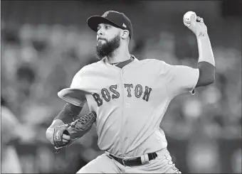  ?? FRANK GUNN/THE CANADIAN PRESS ?? Red Sox starting pitcher David Price (24) works against the Blue Jays during the first inning of Saturday’s game at Toronto. Price got the victory as the Red Sox won 5-2.