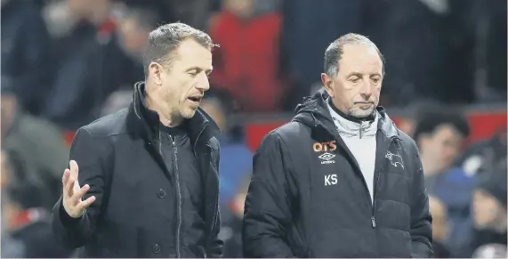  ??  ?? Derby manager Gary Rowett and coach Kevin Summerfiel­d.