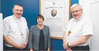  ?? ?? Bishop Tim Harris, TCE executive director Jacqui Farncis and Archbishop Charles Balvo blessing The Putney Collection.