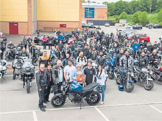  ??  ?? From left: Graeme’s father and mother Ian and Dorothy, Grant Duncan, Dean Buchanan, Graeme’s widow Jenni Bell with a defibrilla­tor, Josh Buchanan and Graeme’s sister Louise at Camperdown where scores of bikers gathered to remember Graeme with a ride out.