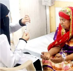  ??  ?? A Yemeni woman suspected of cholera is treated at a hospital in the Yemeni coastal city of Hodeida. — AFP photo