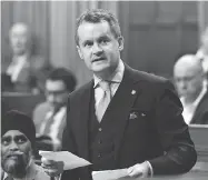  ?? JUSTIN TANG / THE CANADIAN PRESS ?? Veterans Affairs Minister Seamus O’Regan says he’s seen “the face of backlog” speaking with veterans at town halls.