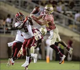  ?? Mark Wallheiser Associated Press ?? ASANTE SAMUEL JR. (26) comes to the Chargers from Florida State as the son of a former NFL cornerback. He is expected to replace Casey Hayward.