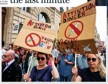  ??  ?? FRENCH RESISTANCE: Anti-vaccine protesters on the streets of Paris yesterday despite the threat of the Beta variant