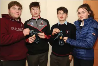  ??  ?? ‘Custom Gloves’ is the brainchild of Coláiste Treasa TY Mini Company students Andrew Murphy, Padraig O’ Sullivan, Sean Murphy, Maria McSweeney. Photo by Sheila Fitzgerald