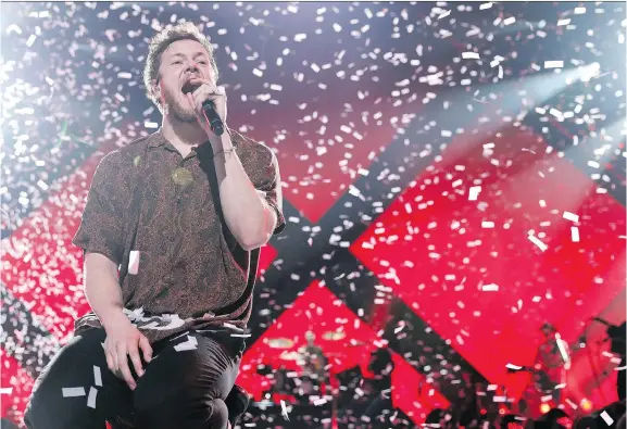  ?? OMAR VEGA/THE ASSOCIATED PRESS ?? Imagine Dragons’ lead vocalist Dan Reynolds takes his job as frontman seriously and is vigilant about protecting his voice and his health when he tours.