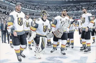  ?? CANADIAN PRESS FILE PHOTO ?? Vegas Golden Knights’ James Neal (18), goaltender Marc-Andre Fleury, Deryk Engelland (5) and the rest of the team celebrate after defeating the Winnipeg Jets in Game 5 of the NHL’s Western Conference final.