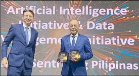 ??  ?? BSP Governor Benjamin Diokno (right) received two awards during the 2019 Central Banking Fintech and Regtech Global Award in Singapore last week. The BSP is the only central bank with two awards—Data Management Initiative using API and its AI-powered Complaints Management Chatbot.