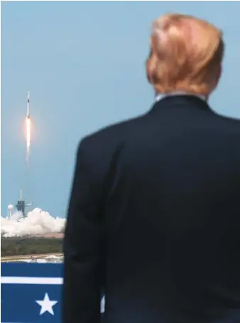  ?? Reuters ?? US President Donald Trump watches the launch of a SpaceX Falcon 9 rocket to the Internatio­nal Space Station from NASA’s Kennedy Space Center in Cape Canaveral, Florida, on Saturday.