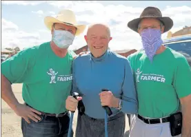  ??  ?? Larry Davis, left, and Doug Davis, right, are pictured with their father, Davis family patriarch John Davis, at their multigener­ational farm in Sterling.