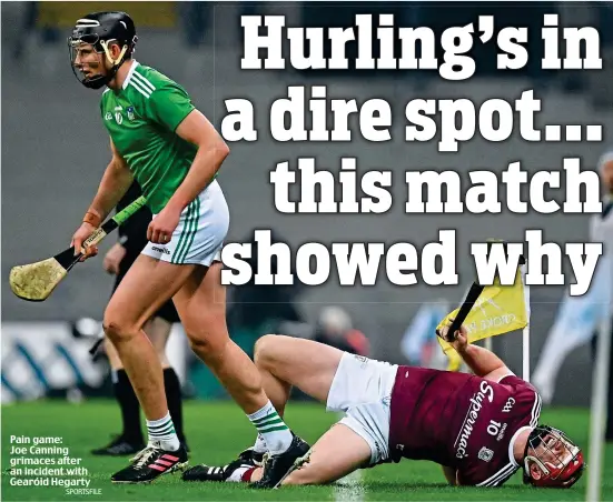  ?? SPORTSFILE ?? Pain game: Joe Canning grimaces after an incident with Gearóid Hegarty