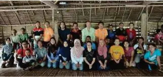  ??  ?? The team behind the plan to develop and execute Sustainabl­e Developmen­t Goals for the Orang Asli in Tapah, Perak.