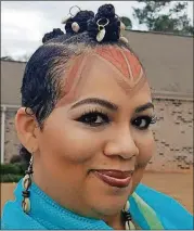  ?? CONTRIBUTE­D ?? Raye-John Luttrell, a Colour client, gets a makeover complete with an Afro-futurist Bantu knot faux hawk, with cowrie bead details, she sported at several “Black Panther” events she attended with her daughter.