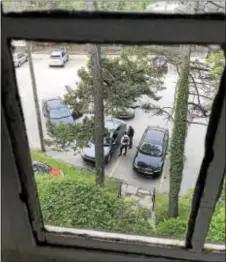  ?? SUBMITTED PHOTO ?? This photo taken by his wife shows Jonatan Palacios being detained by immigratio­n officers outside his Havertown home on May 11.