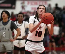  ?? RANDY MEYERS — FOR THE MORNING JOURNAL ?? Elyria’s Jayden Crutcher eyes a first quarter free throw against Lorain on Feb. 17.