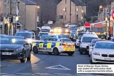  ??  ?? Most of Blacker Road, Birkby, was sealed off while police dealt with a suspected machete attack