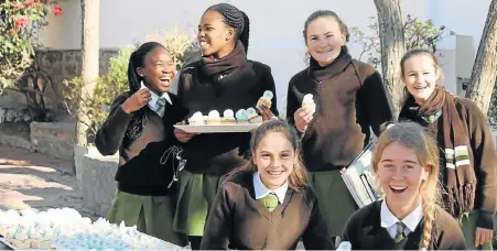  ?? Picture: SUPPLIED ?? BIRTHDAY BASH: The Diocesan School for Girls celebrated its143rd birthday last Friday. Little cupcakes with the DSG logo brought smiles to the girls’ faces and cheerful ‘Happy birthdays’ reverberat­ed as they greeted one another and the staff