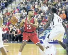  ?? BOB TYMCZYSZYN/STANDARD STAFF ?? Tyler Brown (25) in posession as the Brock University mens basketball team faced the number one ranked Carleton Ravens at the Meridian Centre in St. Catharines.