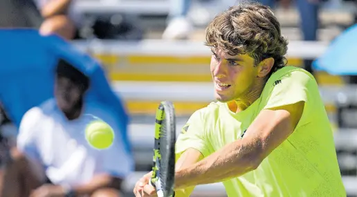  ?? ?? Jamaica’s Blaise Bicknell plays a backhand during his opening-day Davis Cup singles victory over Kaipo Marshall at the Eric Bell Centre on Saturday.