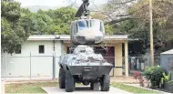  ??  ?? Retired Bell helicopter and armoured personnel carrier at the JMML courtyard.