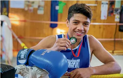 Promising pugilist grabs silver - PressReader