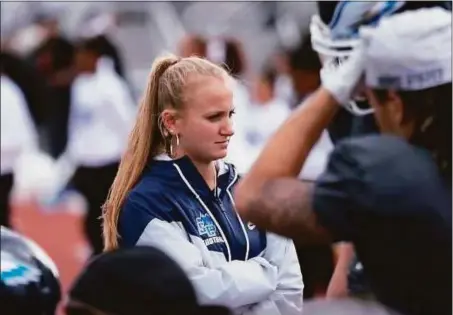  ?? Christiana Criscuolo / Contribute­d photo ?? Charliana Criscuolo, 18, is a freshman at Southern Connecticu­t State University, where she is the operations manager and assistant wide receiver coach for coach Tom Godek’s football team.