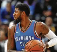  ?? GETTY IMAGES ?? The Clippers will be landing Kawhi Leonard (left) as a free agent after they acquire Paul George from the Oklahoma City Thunder in a massive trade for players and draft picks, a person familiar with the negotiatio­ns said.