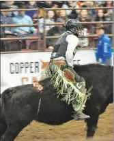  ?? Photos by Ryan Dahlman ?? Lethbridge junior steer rider Nolan Calf Robe had a good ride but lost on day winner Jestin Jacklin (Ponoka) during the ride April 23.