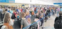  ?? CARLINE JEAN/STAFF PHOTOGRAPH­ER ?? Fort Lauderdale Internatio­nal Airport was jammed earlier this week as tourists evacuated and residents sought to flee the monster hurricane.