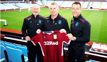  ??  ?? Dean Smith (centre) alongside assistant managers Richard O’Kelly and John Terry (right) after the press conference at Villa Park in Birmingham, Britain. — Reuters photo