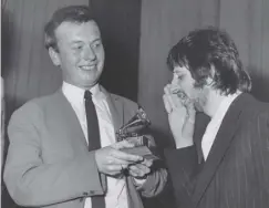  ??  ?? 0 Ringo Starr congratula­tes Geoff Emerick (left) in 1968 on his Grammy Award for Sgt Pepper’s Lonely Hearts Club Band