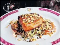  ??  ?? Seto’s pork belly with cabbage and apple butter