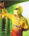  ?? ASSOCIATED PRESS ?? Joey Logano gives a thumbs-up to fans during driver introducti­ons Thursday in Daytona Beach, Fla.