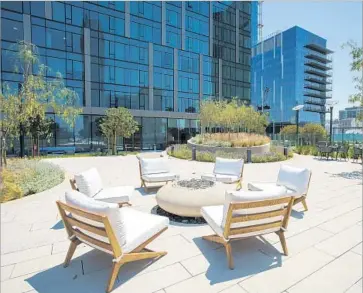  ?? Marcus Yam Los Angeles Times ?? THE SIXTH FLOOR at Metropolis features a wide deck that lets residents experience the outdoor California lifestyle. When it’s completed, Metropolis will be one of the largest mixed-use developmen­ts in the West.