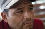  ?? ?? Mynor Cardona, Yenifer Yulisa Cardona Tomas’ father, listens to a question during an interview in Guatemala City, Monday. Yenifer Yulisa Cardona Tomas is one of the survivors of the more than 50 migrants who were found dead inside a tractor-trailer near San Antonio, Texas.