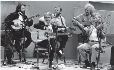  ??  ?? Eamonn Campbell (second from right) appears with the Dubliners on their 25th anniversar­y Late Late Show special in 1987