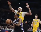  ?? MARCIO JOSE SANCHEZ — THE ASSOCIATED PRESS ?? De’aaron Fox’s career high-equaling scoring performanc­e helped the Kings beat the Lakers on Wednesday night.