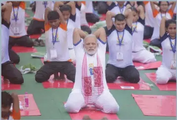  ??  ?? Indian Prime Minister Narendra Modi participat­ed in the Yoga event at Lucknow’s Ramabai Ambedkar Maidan where he was joined by another 50,000 people on June 21, 2017.