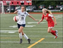  ?? MJ MCCONNEY - FOR DIGITAL FIRST MEDIA ?? Pope John Paul II’s Julia Hall (11) tries to gain possession as Owen J. Roberts’ Kylee MacLeod pursues.